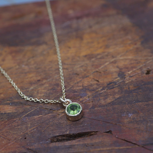 Yellow gold Peridot pendant with chain. August Birthstone