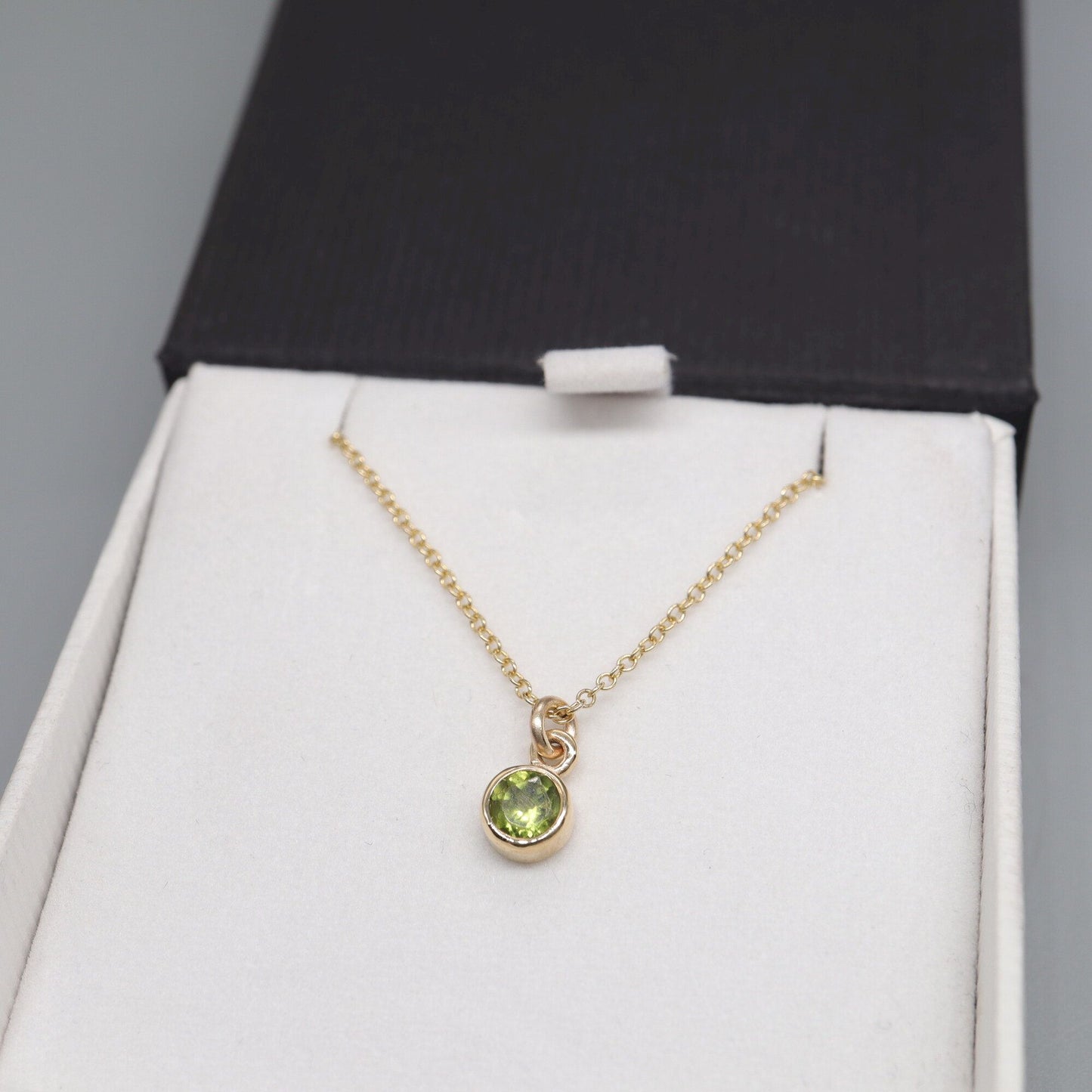 Yellow gold Peridot pendant with chain. August Birthstone