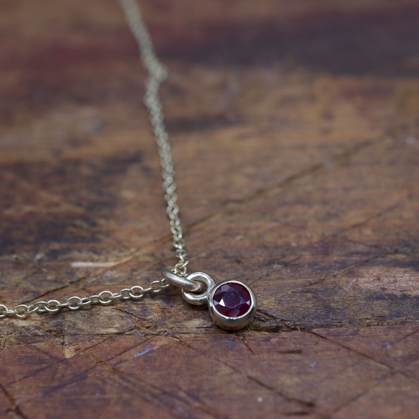 Yellow gold natural Ruby pendant with chain. July Birthstone