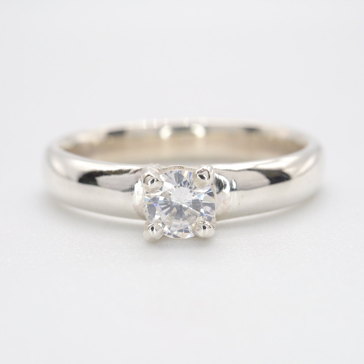 Solitaire diamond white gold Carlisle quarter carat handmade ring.