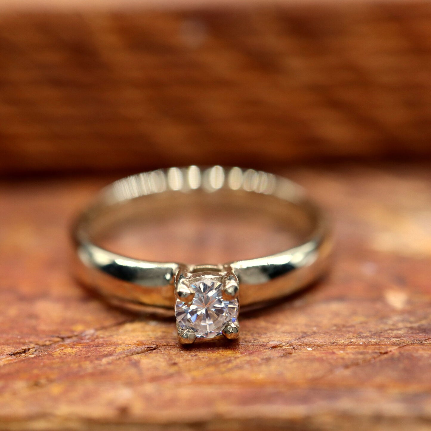 Diamond solitaire larger gold ring, Carlisle design, quarter carat.