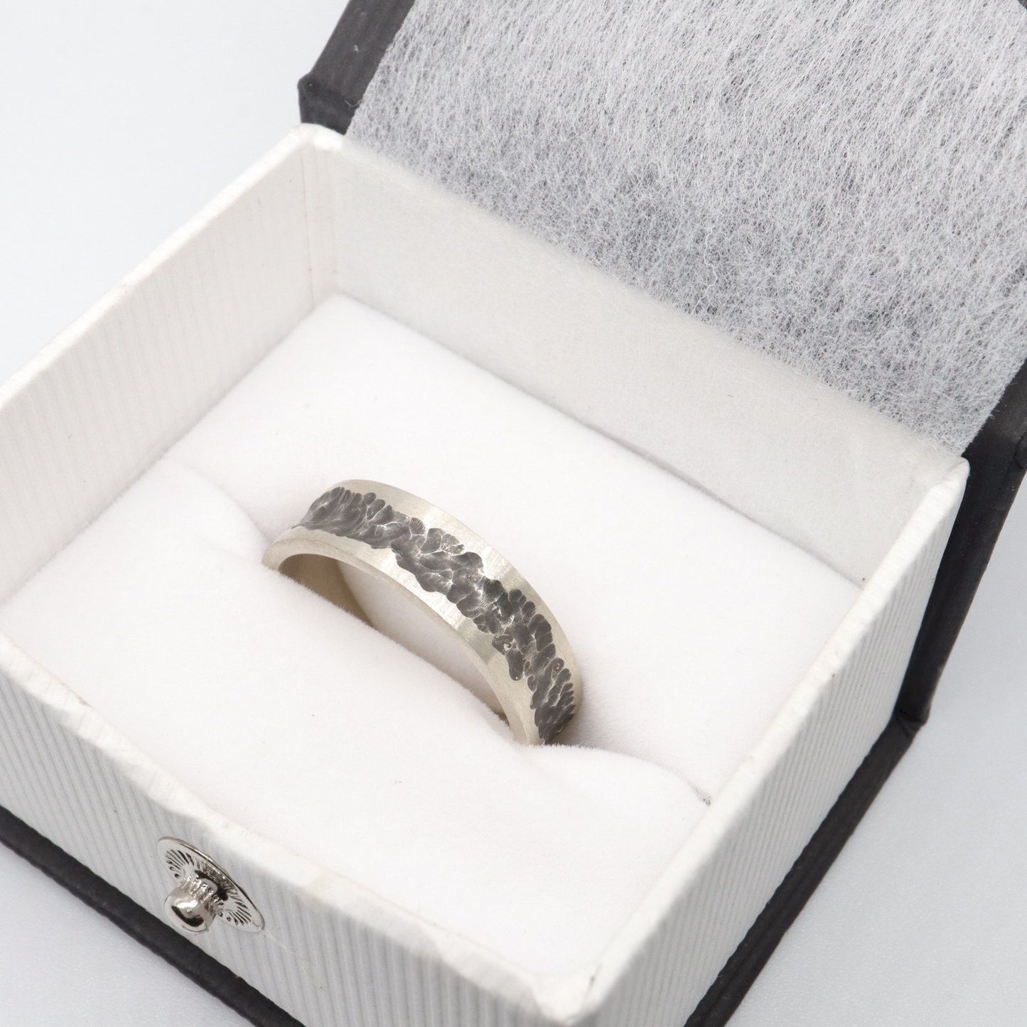 Mens wedding, promise or engagement ring with a carved out pattern, Cat Bells design.
