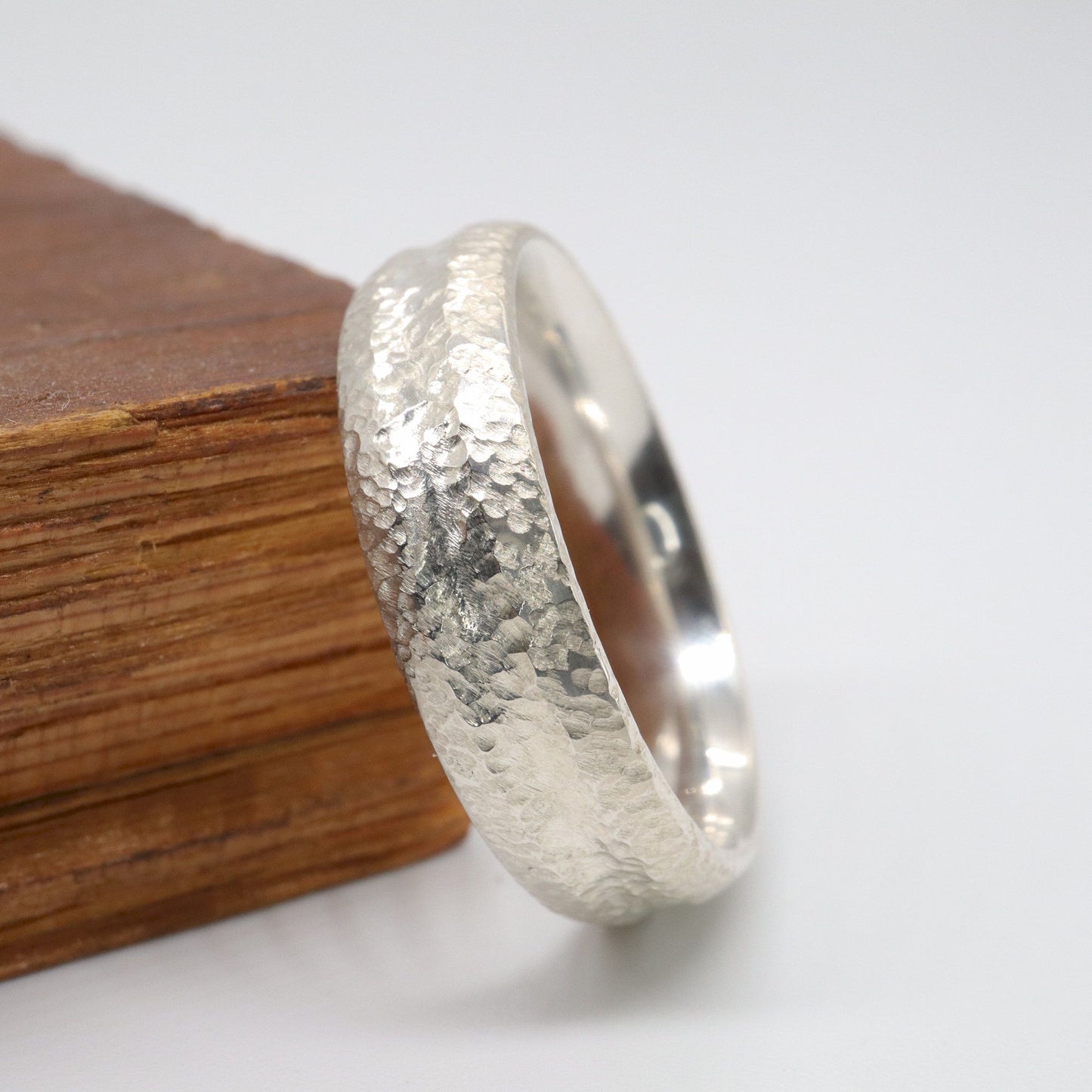Silver mans promise, engagement or wedding ring with a carved rustic pattern, Fleetwith Pike design.