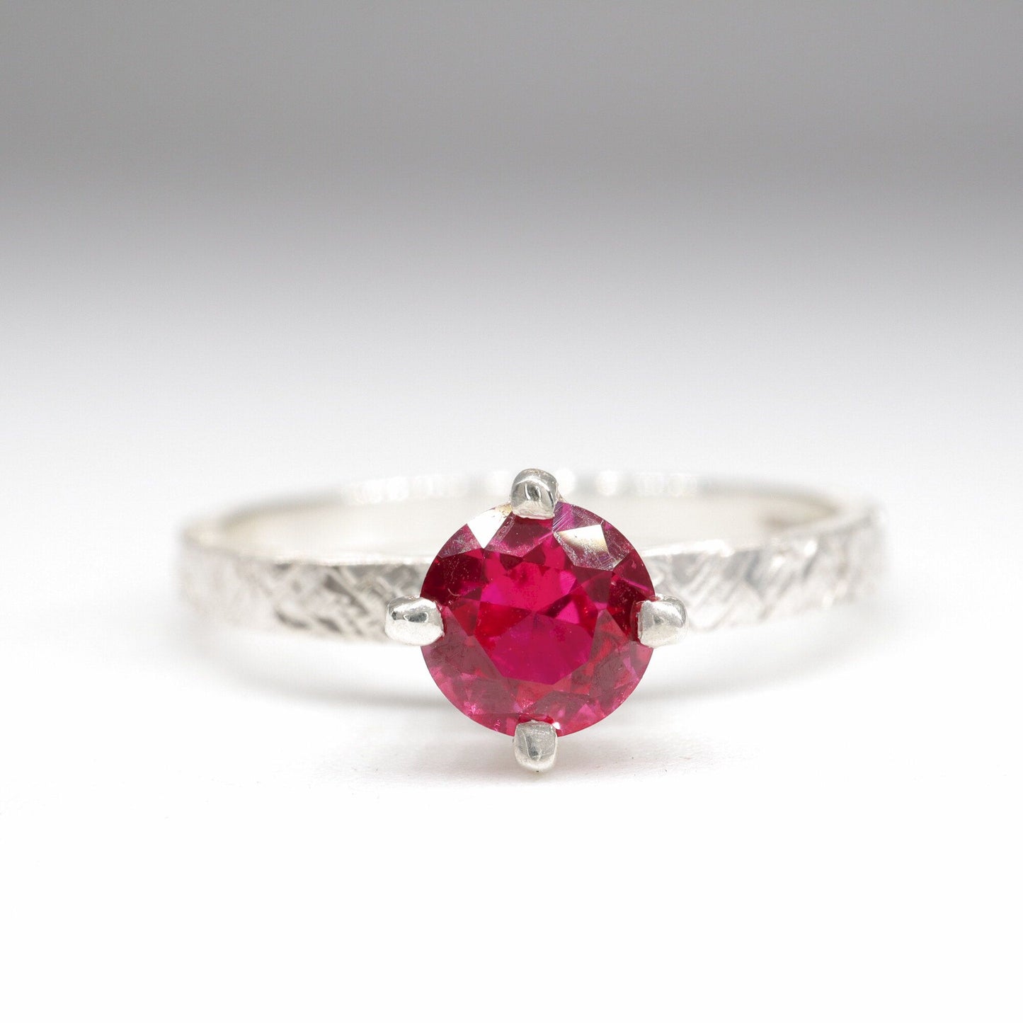 Ruby solitaire gold Kendal design ring