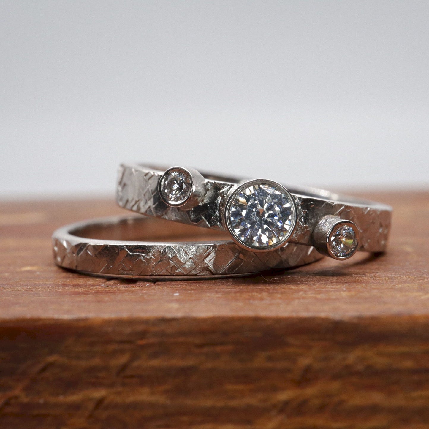 Trilogy diamond bridal set, Kendal white gold three stone rustic design ring and matching 2mm band.