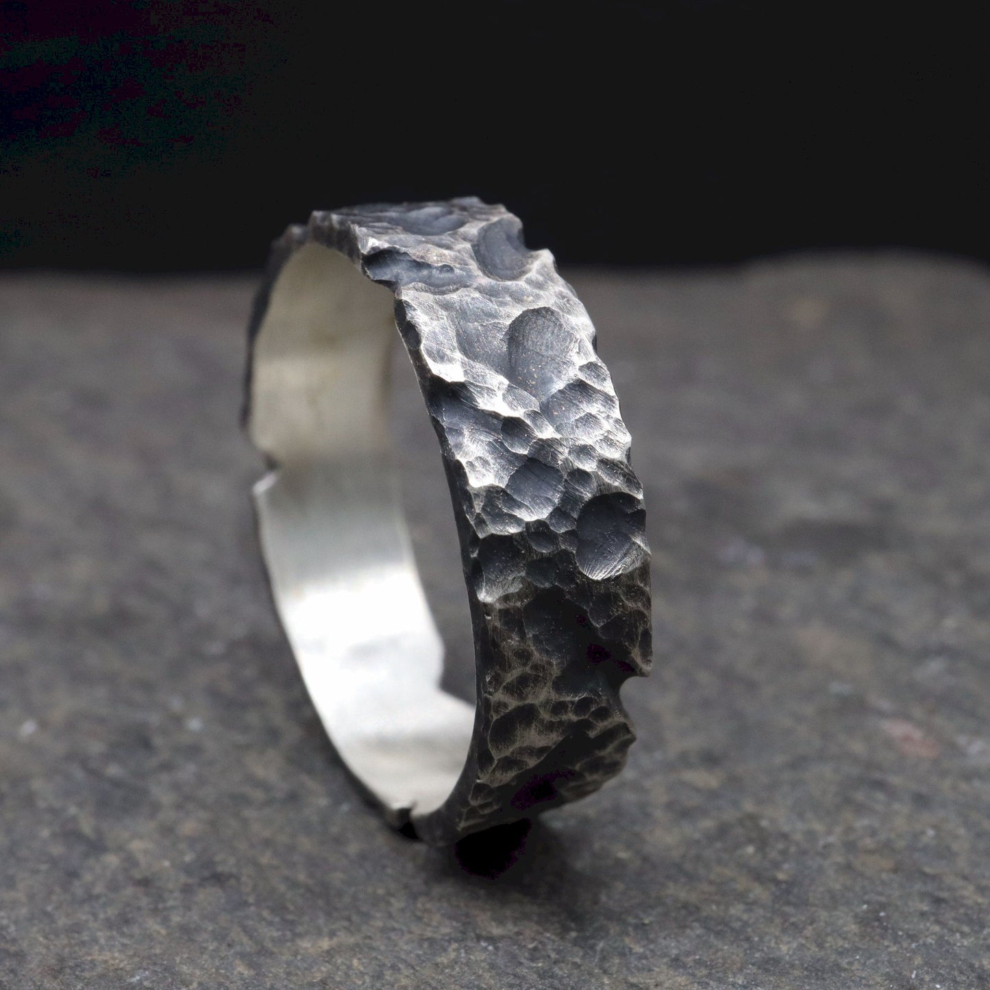 Lakeland Rock mens wedding, promise or engagement ring with a hand carved design.