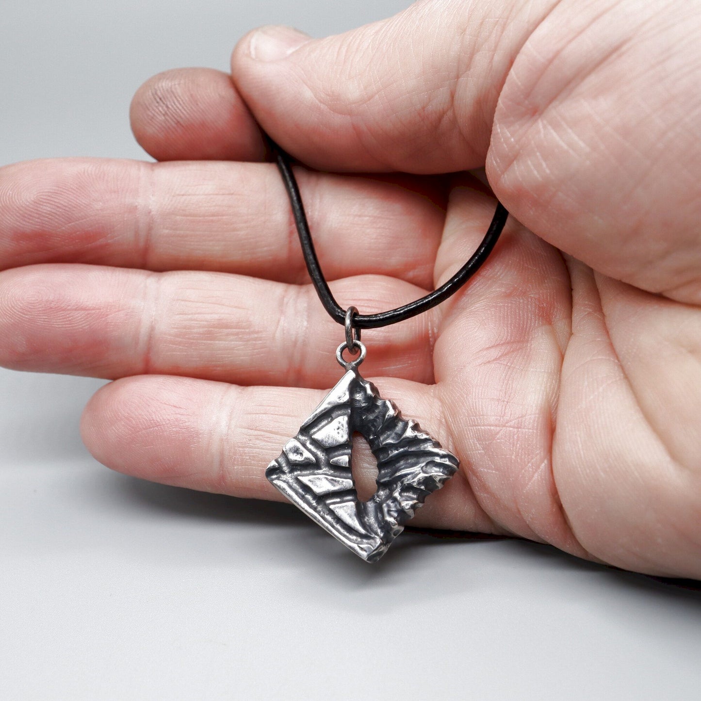 Silver mens pendant - No Return, Lakeland Rock design, original mens jewellery