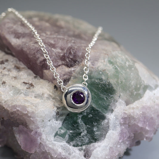Amethyst runner pendant, silver slider button design, February Birthstone