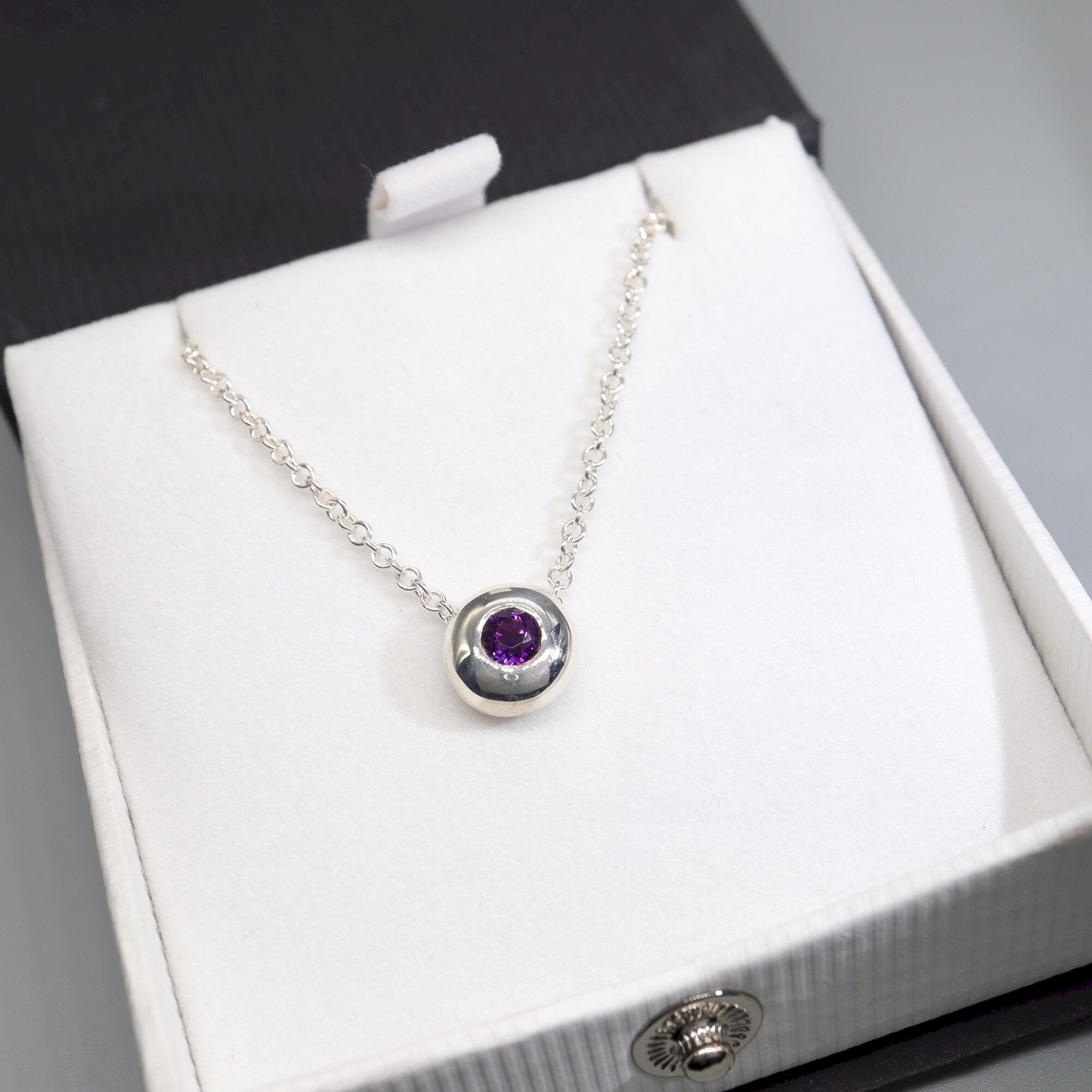Amethyst runner pendant, silver slider button design, February Birthstone