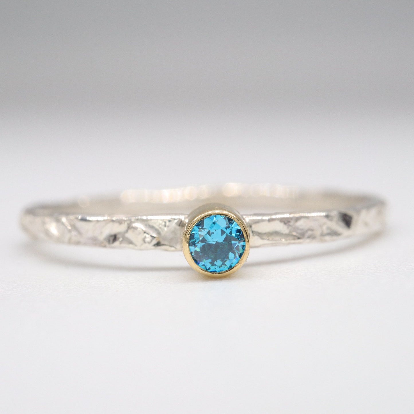 Blue Topaz 18ct gold and silver stacking ring, Striding Edge design.