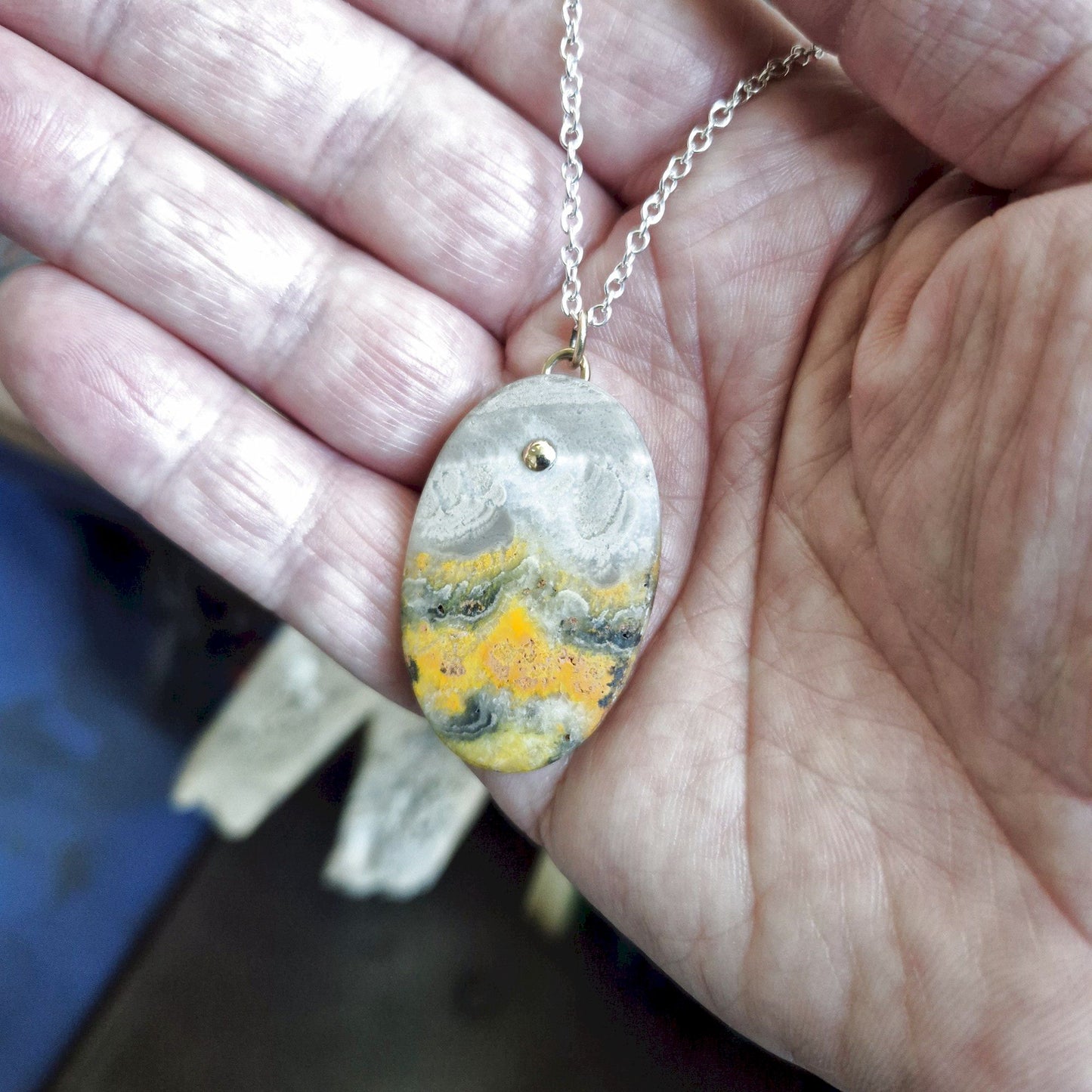 Bumblebee Jasper oval drop gold and silver pendant
