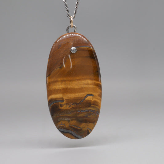 Very large Tigers Eye oval pendant