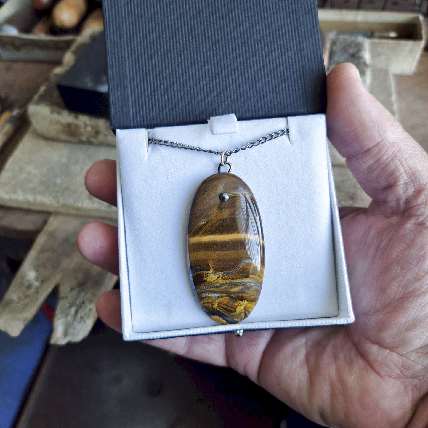 Very large Tigers Eye oval pendant