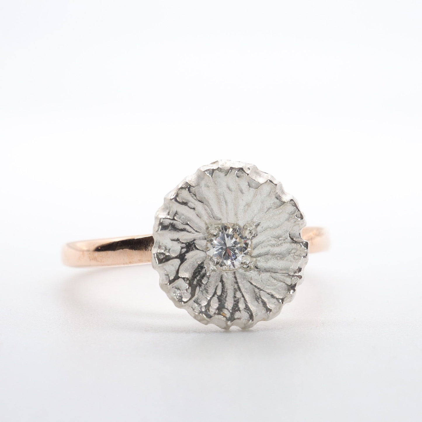 Diamond set rose gold Water Lilies solitaire ring.