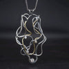Diamond set 18ct gold and antique dark stained silver handmade Medusa necklace