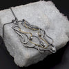 Diamond set 18ct gold and antique dark stained silver handmade Medusa necklace