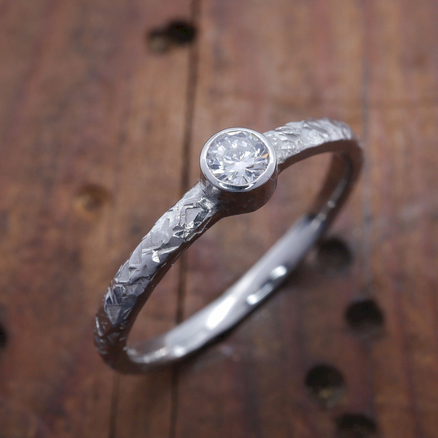Solitaire diamond white gold Fire design ring, 0.15ct