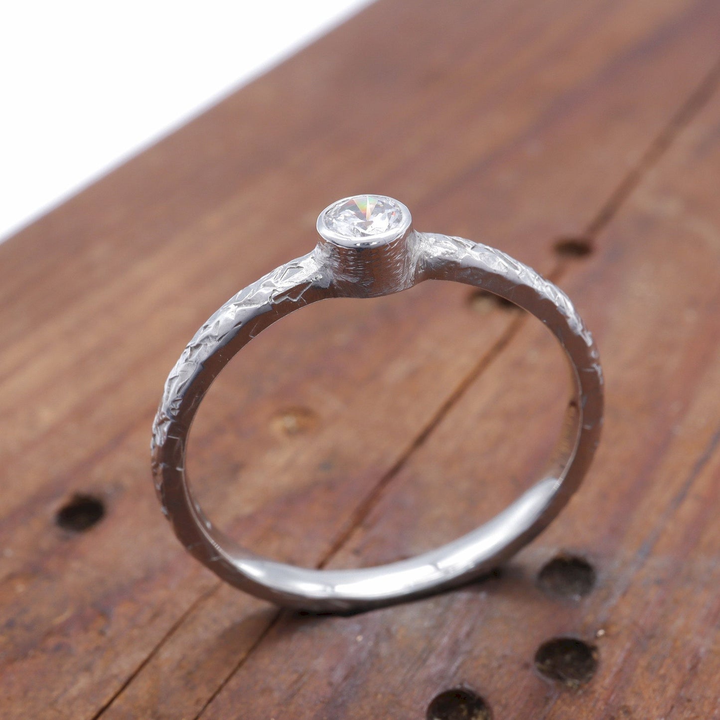 Solitaire diamond white gold Fire design ring, 0.15ct