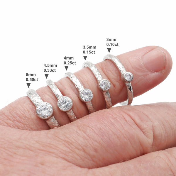Solitaire diamond 18ct white gold Fire design ring, 0.15ct