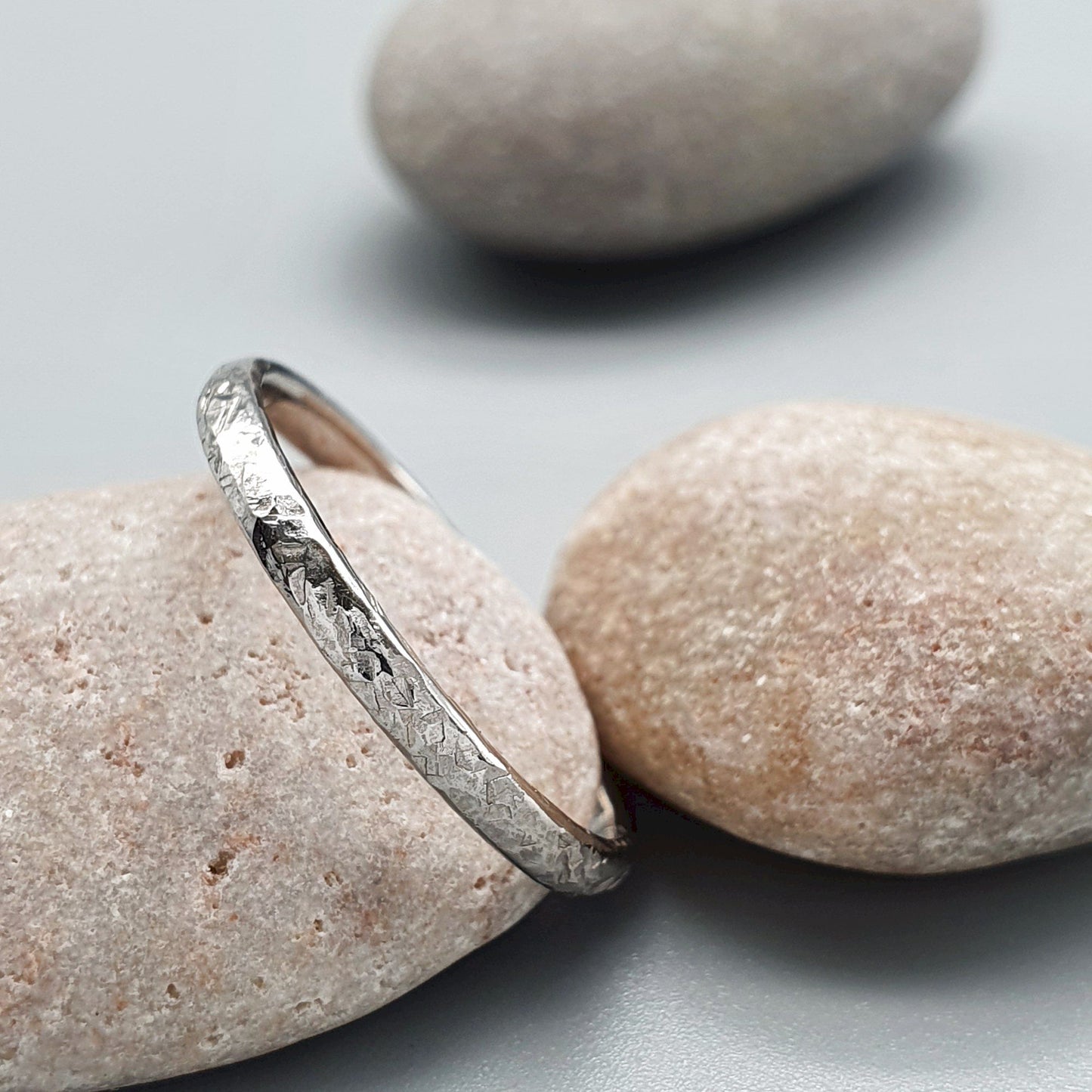 Wedding ring, thin white gold Fire hammered design