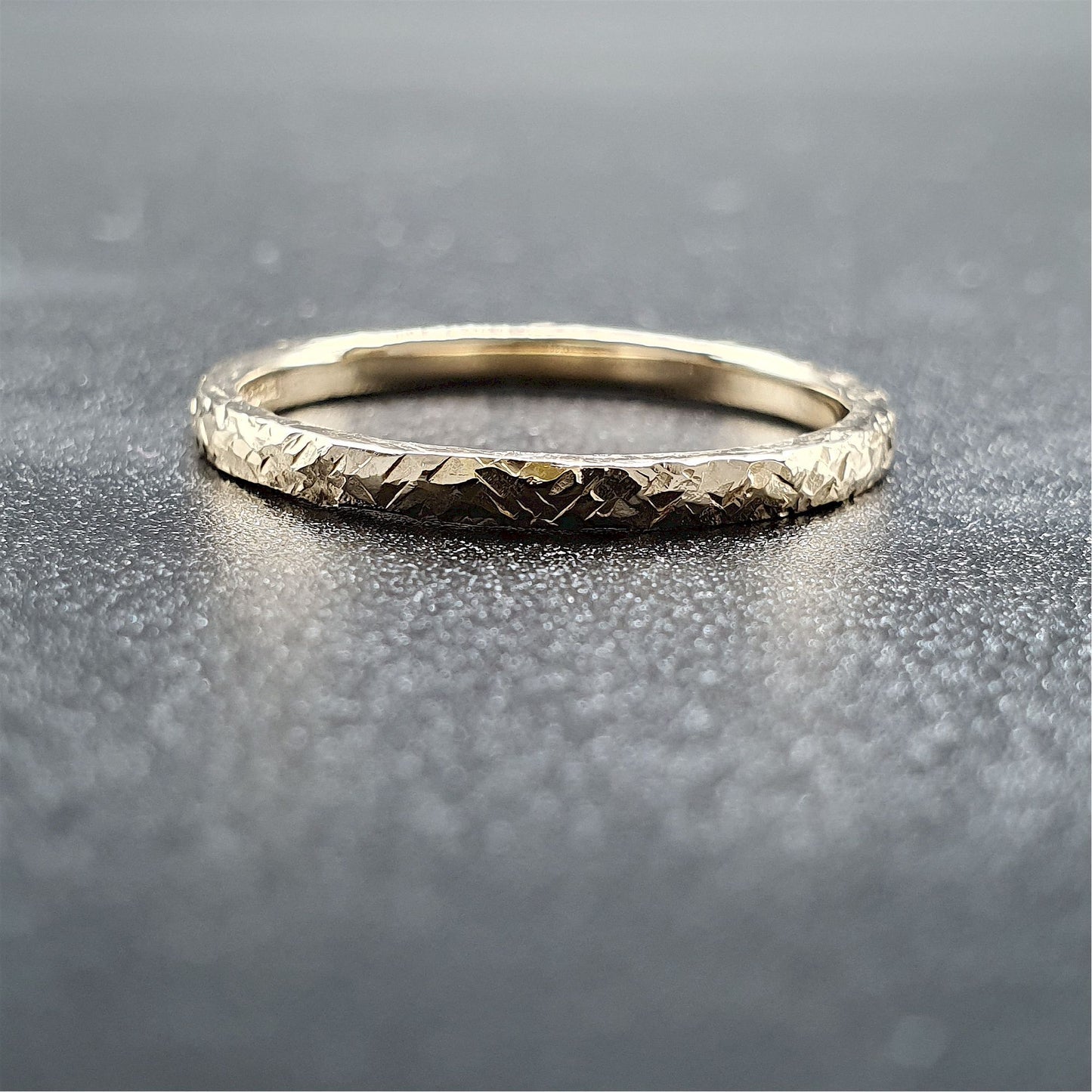 Wedding ring, thin yellow gold Fire hammered design - Cumbrian Designs