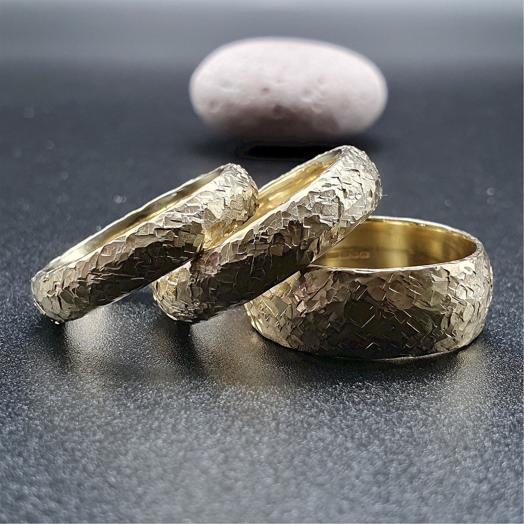 Wedding ring, broad yellow gold Fire hammered design | Cumbrian Designs