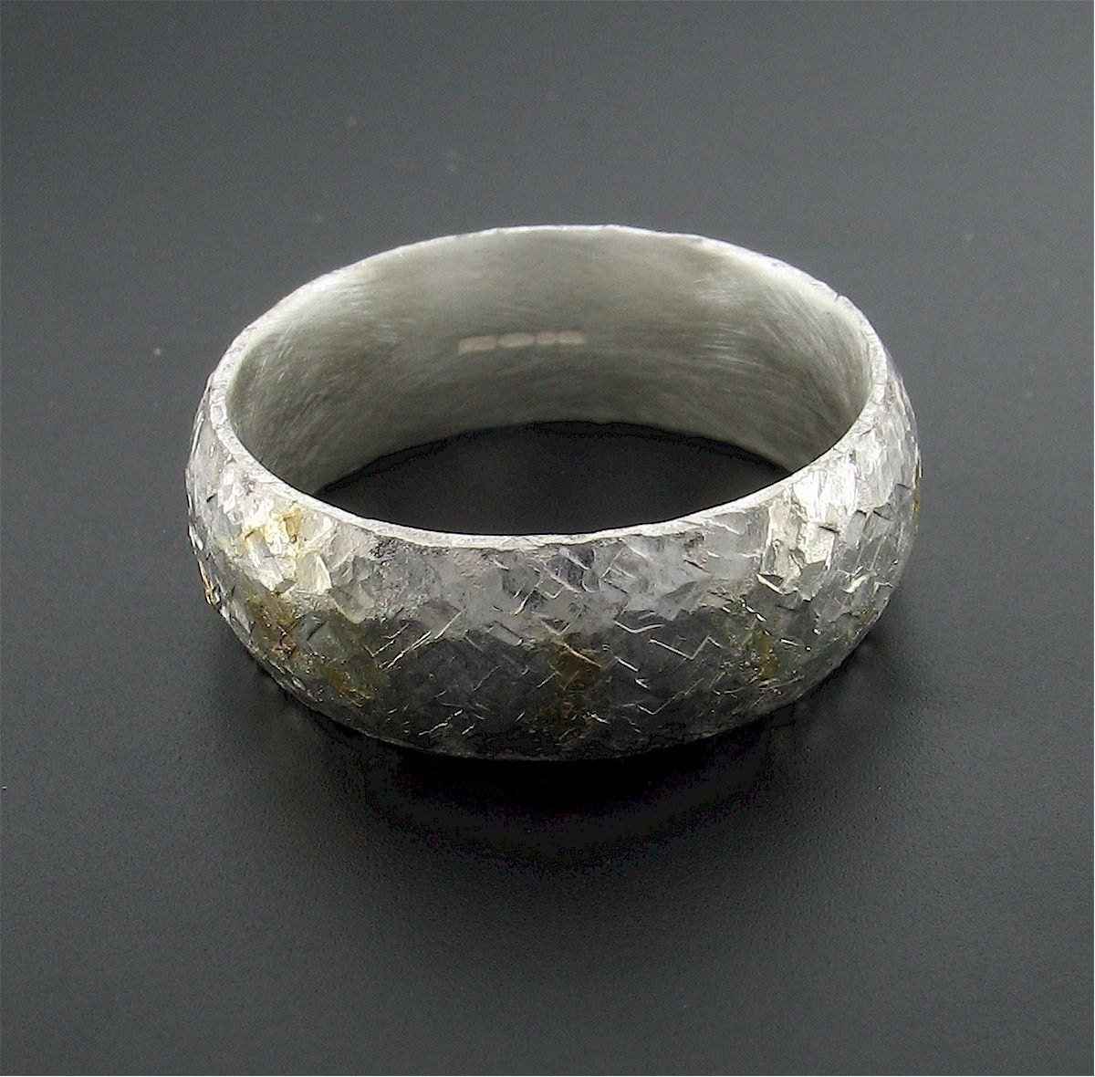 Silver and gold Sunrise 8mm court wedding ring with rustic hammered  surface. Original design handmade band for a man