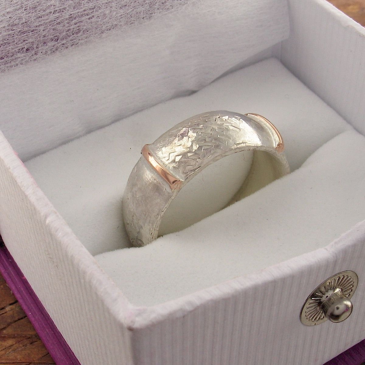 Rustic 8mm wedding ring in rose gold and silver, Lakeland Mine White design. Designer Wedding Rings Wedding Ring 