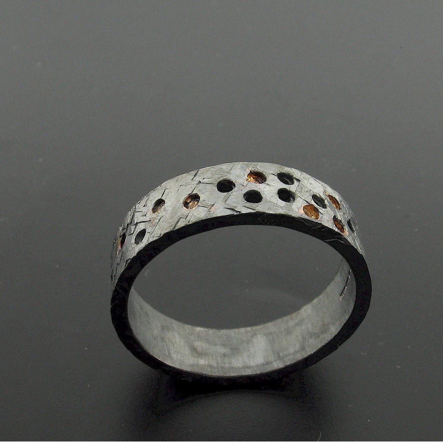 Black hammered wide wedding ring Night Stars design. - Cumbrian Designs