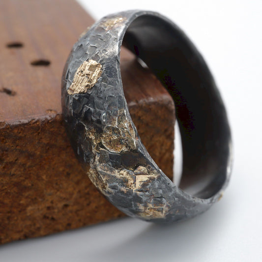 Wedding ring, black silver and gold hammered Night Sky design.