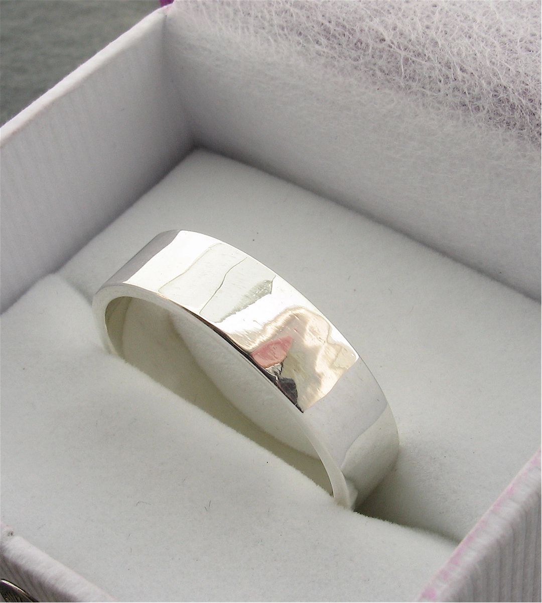 White gold broad wedding ring, Water Ripples design Designer Wedding Rings CumbrianDesigns 
