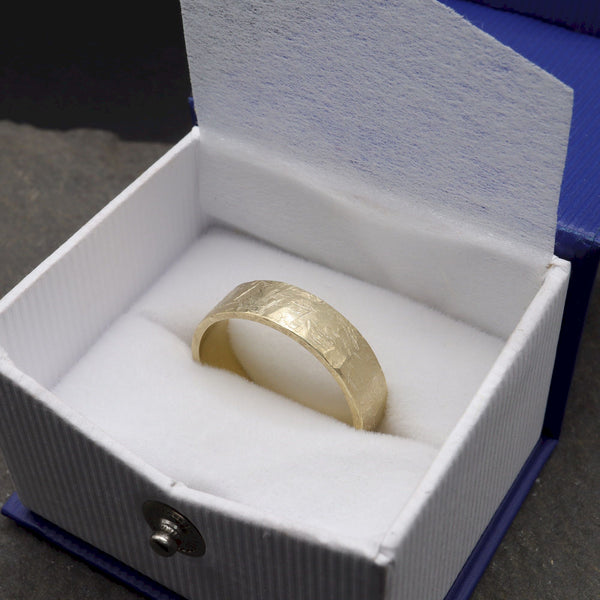 Yellow gold broad wedding ring - rustic flat hammered textured band - Windermere design.